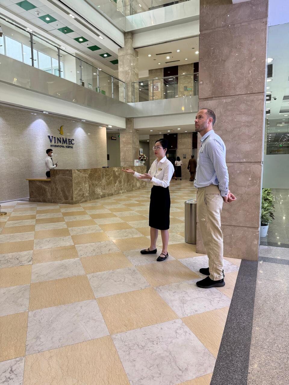 Our founder in the lobby of a partner hospital in Vietnam