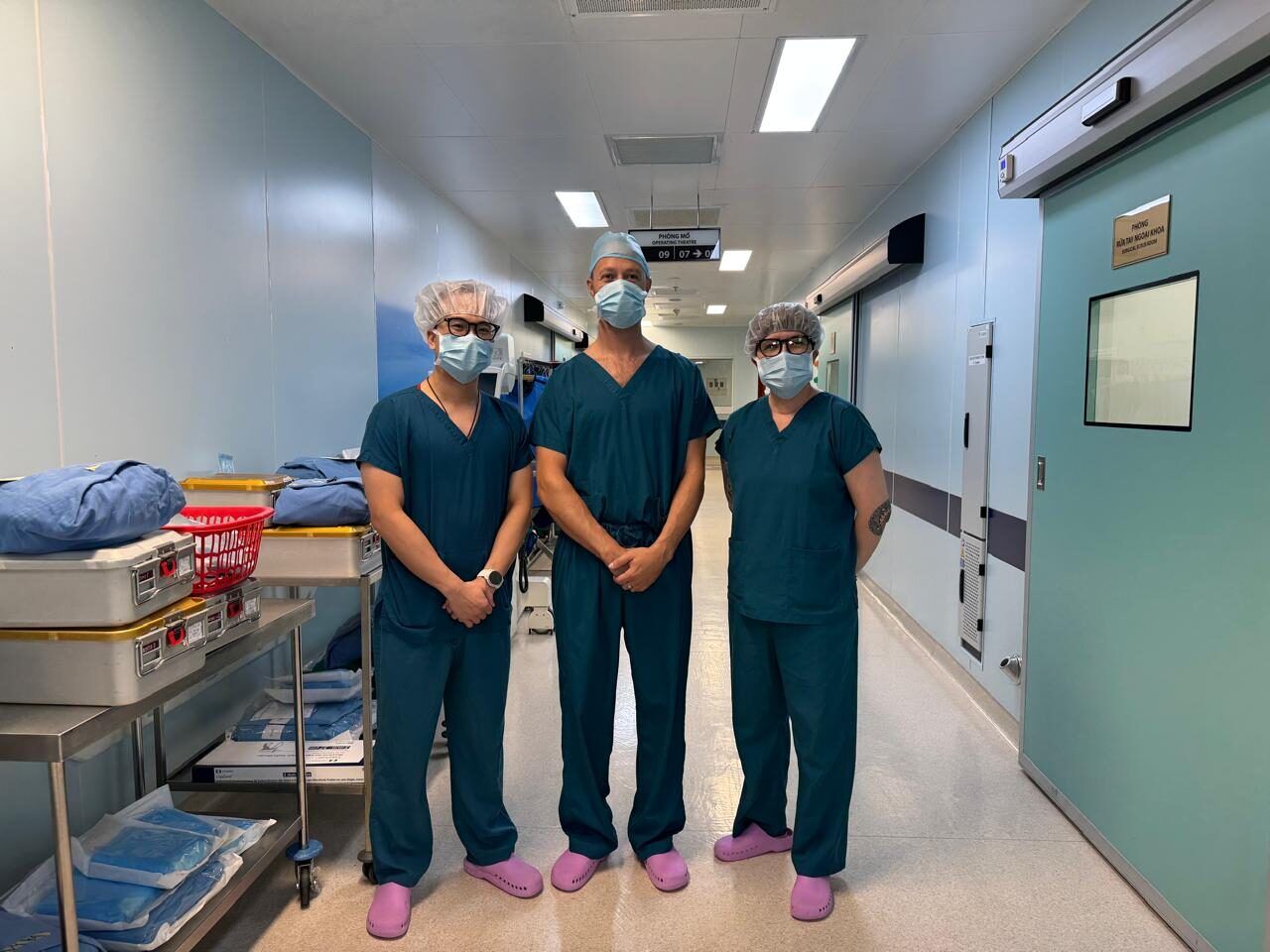 Our founder in the surgical suite with the operating team in Vietnam