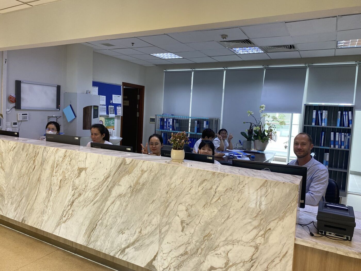 Reception team at a partner hospital in Vietnam
